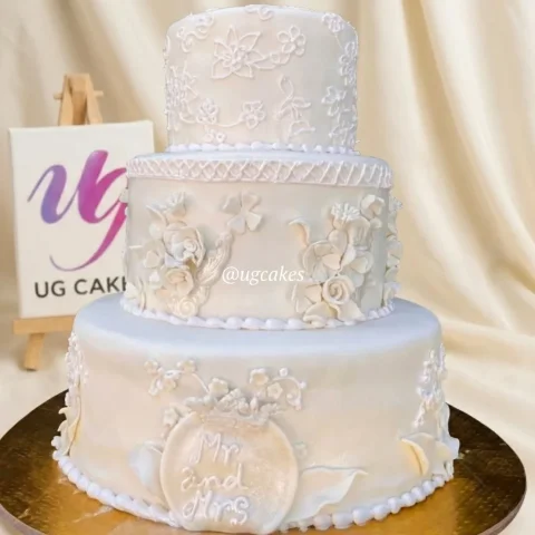 White Wedding Cake with Lace Details