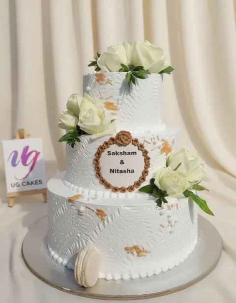 Elegant White Wedding Cake with Fresh Flowers