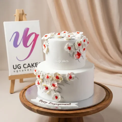 Double Decker White Cake with Cream Flowers
