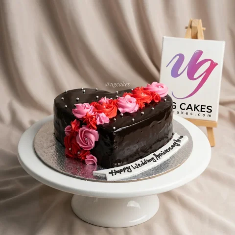 Heart Shaped Chocolate Cake with Pink and Red Flowers