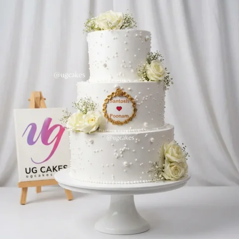 Flower, Pearls Decorated Triple Deck Beautiful Wedding Cake