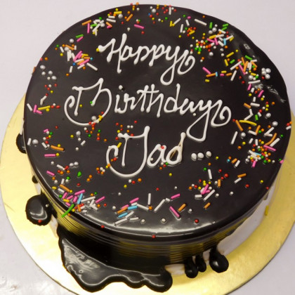 White Chocolate Drip Cake with Colorful Sprinkles