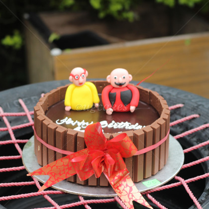 Chocolate Cake with Cartoon Figure