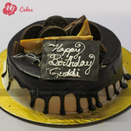 Chocolate Cake Topped with Oreo's and Cadbury