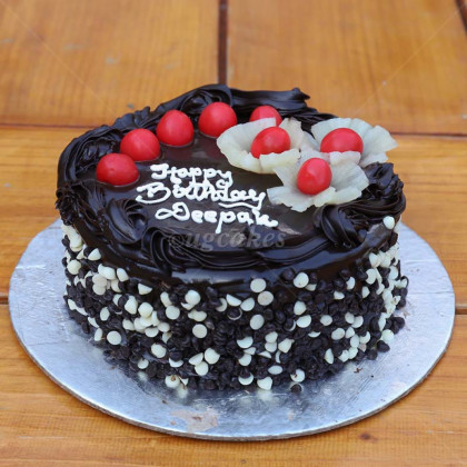 Dark Black Chocolate cake with cherry toppings