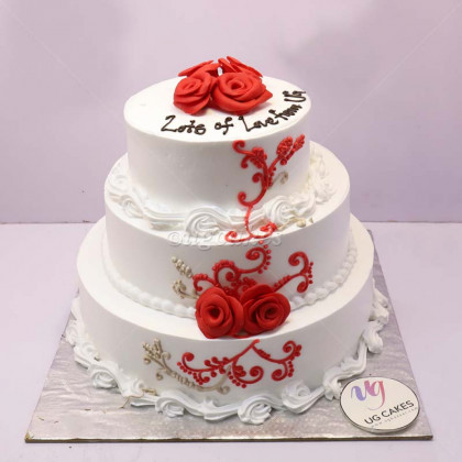 Triple Decker Wedding Cake with Rose Toppings