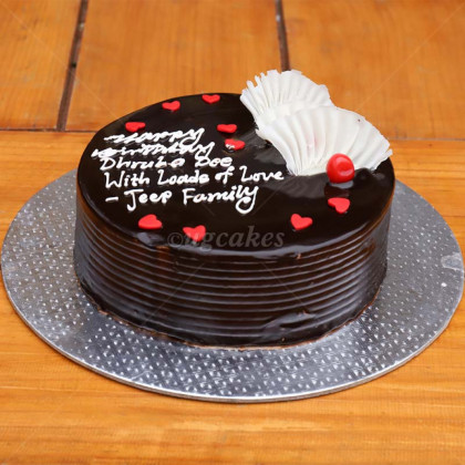 Black Chocolate Cake With Hearts and White Chocolate Drape