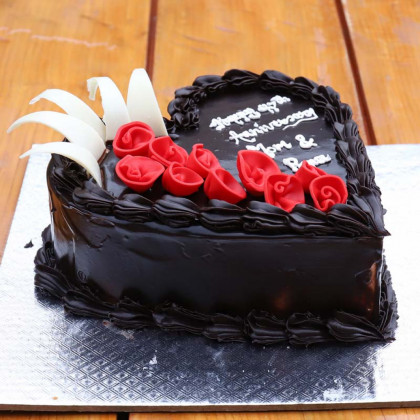 Heart Shaped Chocolate Cake with Red Fondant Flowers