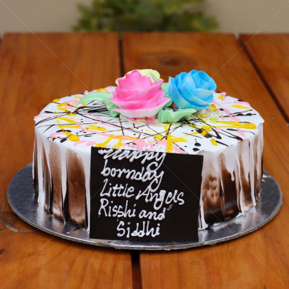 Multi Color Flowers on a Choco-Cream Pattern CakeWhite Forest Cake with Flowery Topping