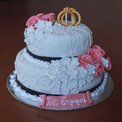 Dome Shaped Double Decker Engagement Cake with Engagement Rings