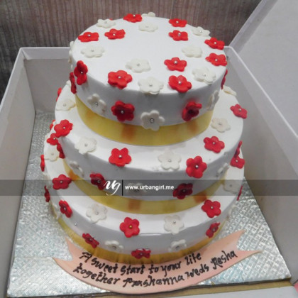 Elegant Wedding Cake with Red and White Flowers