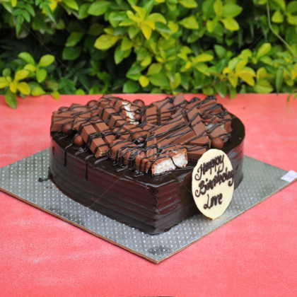 Chocolate Cake topped with Chocolate bars
