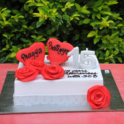 Anniversary Cake with Fondant Red Hearts and Roses