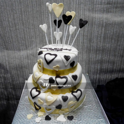 Triple Decker Wedding Cake with Fondant and Heart Lollipops