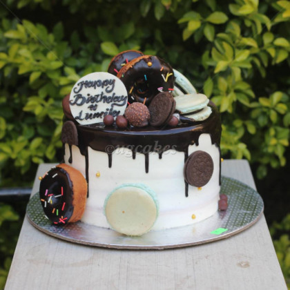 Chocolate Cake with Yummy Donuts and Macrons