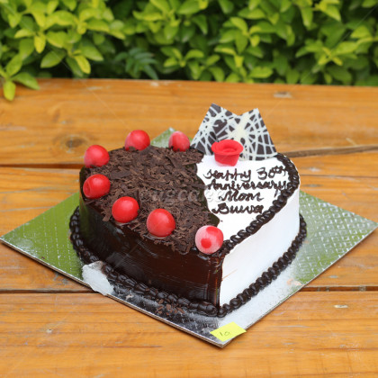 Heart Shaped Chocolate Cake With Cherry