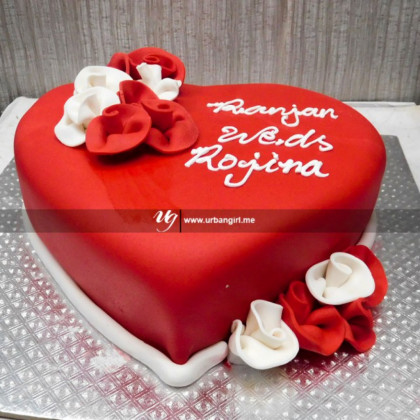 Anniversary Bliss: Heart-Shaped Fondant Flower Cake