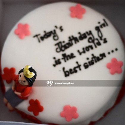 Floral Fantasy Birthday Cake with Fondant, Flowers, and a Figurine