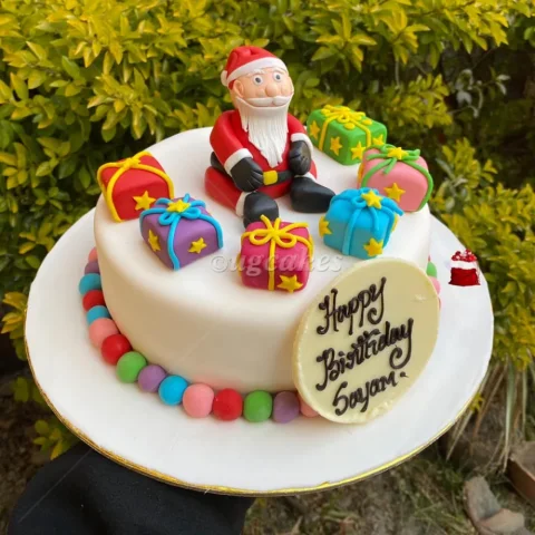 Christmas Cake Decorated With Santa And Gifts