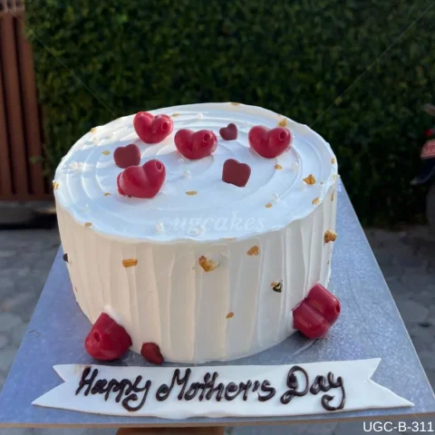 Minimalistic White Cake with Red Heart chocolates
